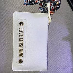 Brand new moschino wristlet purse w optional strap